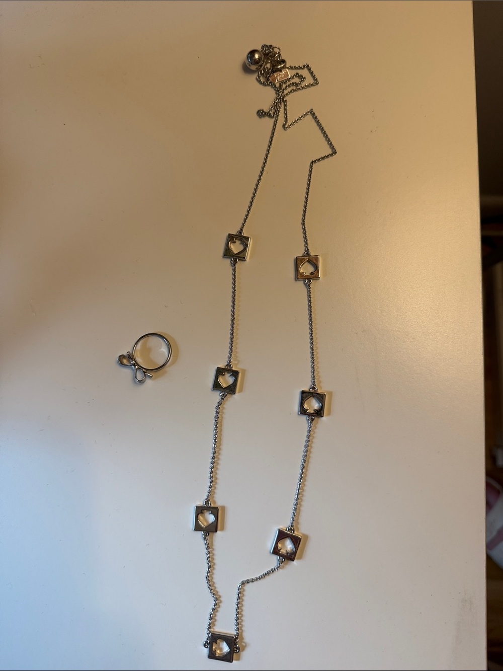 Kate spade silver set! Spade punch long necklace and bow ring - size 7.